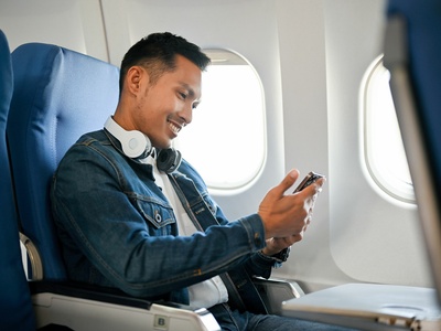 Passenger onbiard aircraft shutterstock 2240205649 - Uncredited